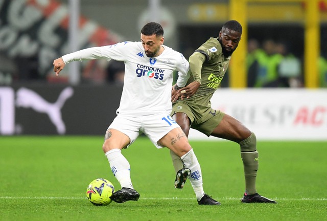 Laga AC Milan vs Empoli di Liga Italia. Foto: Daniele Mascolo/REUTERS