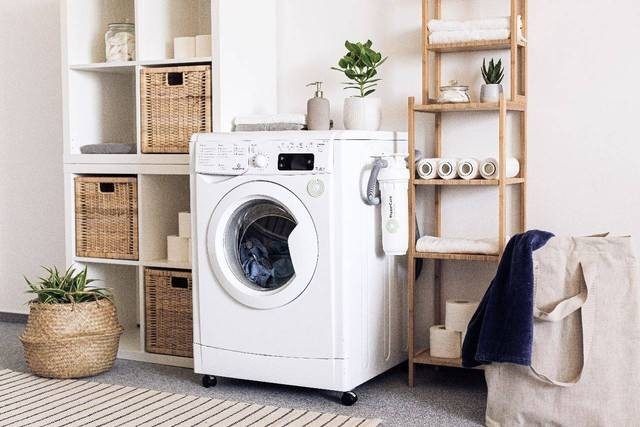 Ilustrasi cara reset mesin cuci Polytron. Foto: unsplash.com