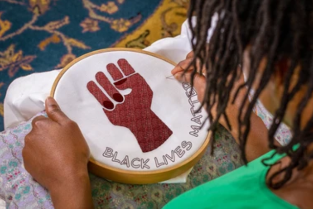 https://www.shutterstock.com/image-photo/craft-activism-woman-sewing-black-lives-1907281426