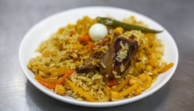 Ilustrasi cara memasak nasi liwet, foto unsplash/Collab Media