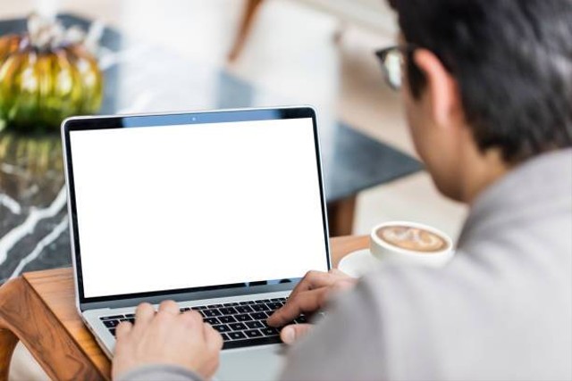 Ilustrasi Cara Log Out Akun Gmail Di Laptop, Foto: Unsplash/guvendemir.