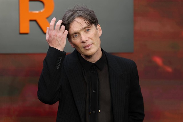 Aktor Irlandia Cillian Murphy berpose di karpet merah setibanya untuk pemutaran perdana Inggris "Oppenheimer" di pusat kota London pada 13 Juli 2023. Foto: Henry Nicholls/AFP