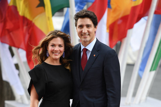 Perdana Menteri Kanada Justin Trudeau dan istri Perdana Menteri Kanada Sophie Gregoire tiba untuk konser di aula konser Elbphilharmonie selama KTT G20 di Hamburg, Jerman, pada 7 Juli 2017. Foto: Patrik STOLLARZ/AFP