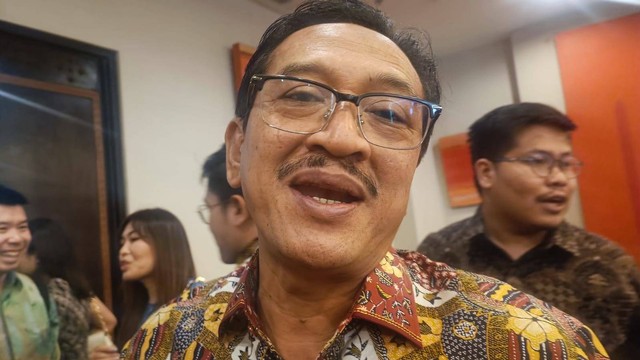 Kepala Departemen Literasi, Inklusi Keuangan dan Komunikasi Otoritas Jasa Keuangan (OJK) Aman Santosa di Auditorium CSIS, Selasa (8/8/2023).  Foto: Ghinaa Rahmatika/kumparan