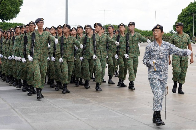 Pasukan Angkatan Siber (DIS) Singapura berparade. Foto: Dok. Facebook DIS Singapore