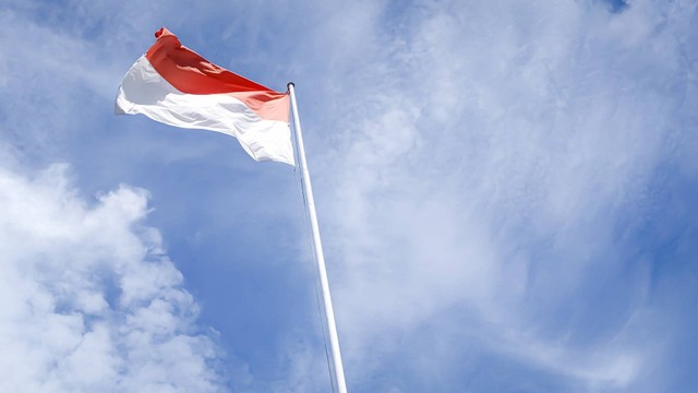 ilustrasi pengibaran bendera (Pexels)