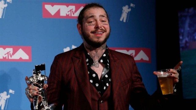 Post Malone memimpin BBMA 2020 Foto: REUTERS/Carlo Allegri