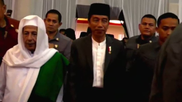 Presiden Joko Widodo menghadiri Muktamar Sufi Internasional di Sahid International Convention Center, Pekalongan, Selasa (29/8/2023).
 Foto: Youtube/Garuda TV