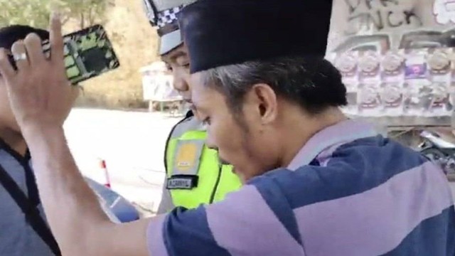 Agus yang mencakar polisi sampai berdarah. Foto: Dok. Istimewa