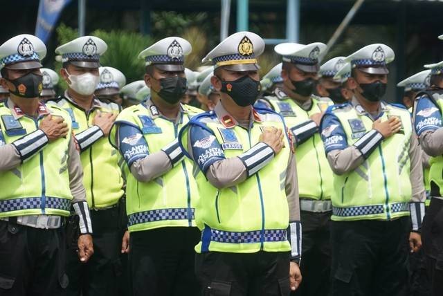 Anggota Dirlantas Polri Berbaris di Lapangan Presisi Polda Metro Jaya, Jakarta, Selasa (13/12). Foto: Iqbal Firdaus/kumparan