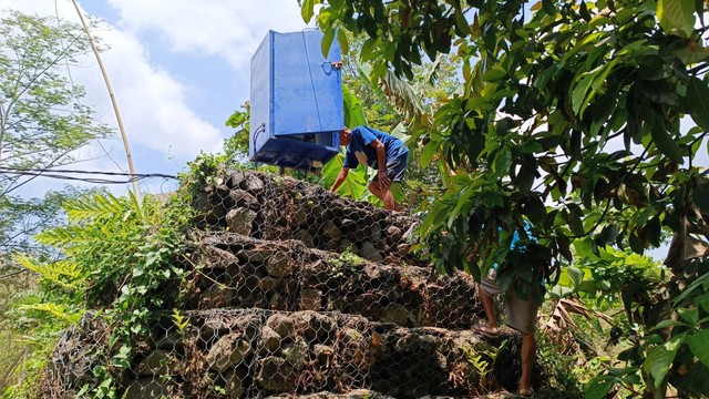 Sumur yang digunakan untuk PAM dusun. Foto: Arfiansyah Panji Purnandaru/kumparan