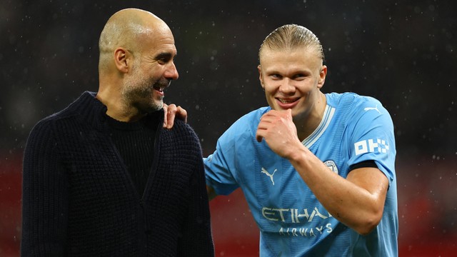 Pep Guardiola dan Erling Haaland usai laga Manchester United (MU) vs Man City dalam lanjutan Liga Inggris 2023/24 di Stadion Old Trafford pada 29 Oktober 2023. Foto: REUTERS/Molly Darlington