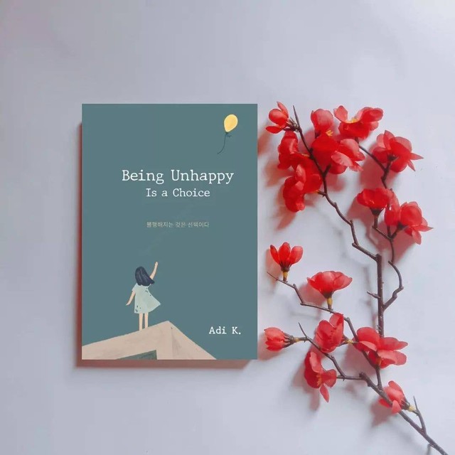 Cover buku Being Unhappy is A Choice. Foto: Rizky Melinda/ Dok. Pribadi