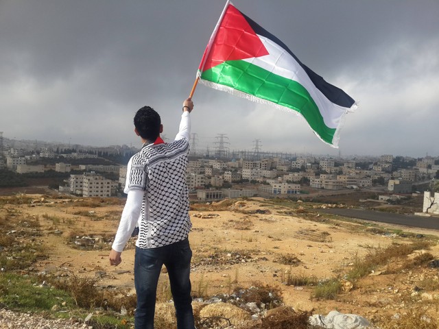 Ilustrasi Caption tentang Palestina. Foto: Unsplash/Ahmed Abu Hameeda