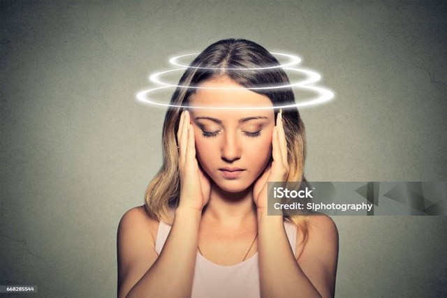 Woman With Vertigo Young Female Patient Suffering From Dizziness Stock Photo