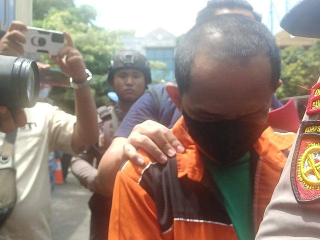 Tampang Driver Ojol yang lecehkan balita di Surabaya. Foto: Dok. Mili.id