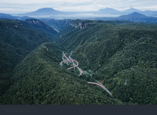 Illustration: The view of Mount Merapi and others from afarby https://www.shutterstock.com/image-photo/kelok-9-west-sumatra-background-gunung-2275398465