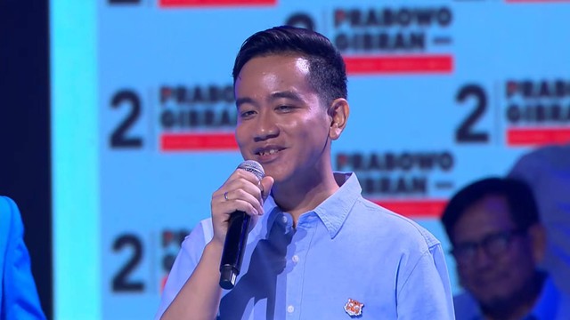 Calon wakil presiden nomor urut 2 Gibran Rakabuming Raka memberikan sambutan saat Konsolidasi Pemenangan Prabowo - Gibran di Sentul International Convention Centre, Bogor, Minggu (10/12/2023). Foto: Youtube/Waktunya Indonesia Maju