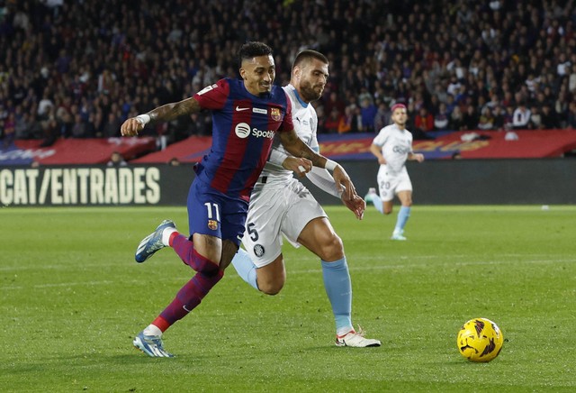 Pertandingan Liga Spanyol 2023/24 antara Barcelona vs Girona, Senin (11/12) dini hari WIB. Foto: Albert Gea/REUTERS