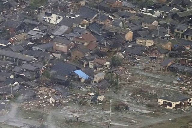 Foto udara kerusakan usai gempa di prefektur Ishikawa, Jepang, Selasa (2/1/2024). Foto: Kyodo/via REUTERS