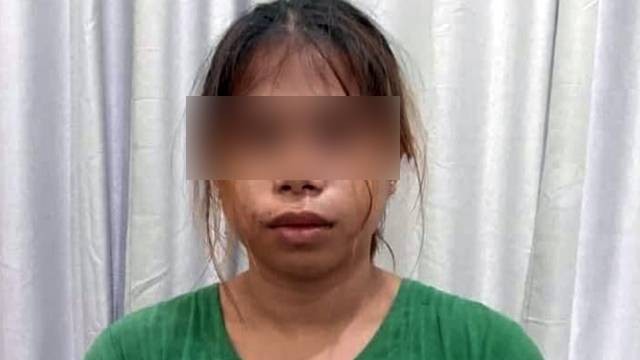 AM alias Anita alias Aning, pelaku pembunuhan bocah di Boltim. Pelaku menggorok leher korban hingga putus untuk diambil perhiasannya. (foto: istimewa)