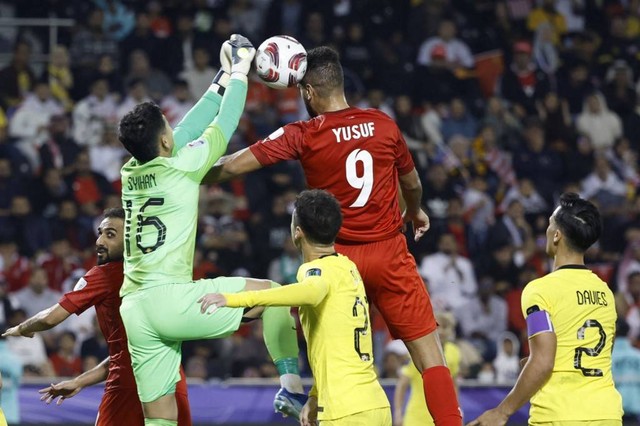 Bahrain vs Malaysia di Piala Asia. Dok: KARIM JAAFAR / AFP