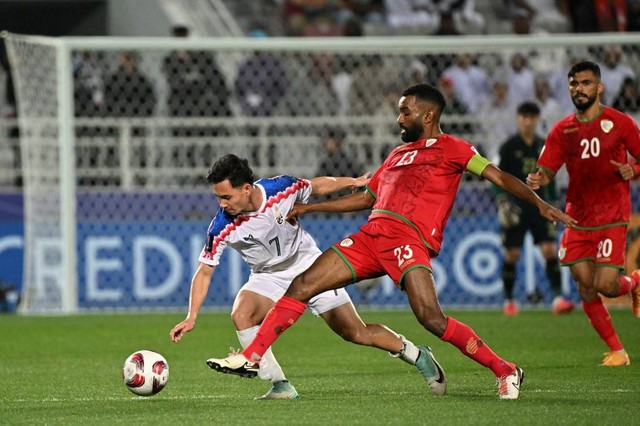 Oman vs Thailand di Piala Asia. Dok: HECTOR RETAMAL / AFP