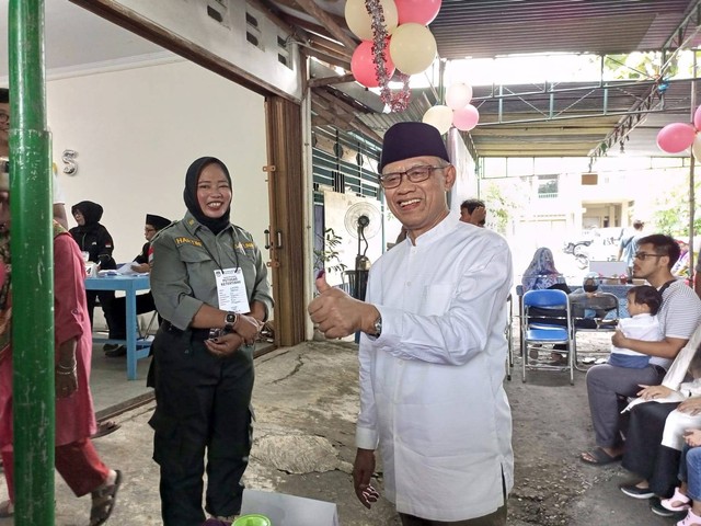 Ketua Umum Pimpinan Pusat (PP) Muhammadiyah, Haedar Nashir usai nyoblos. FOto: M Wulan
