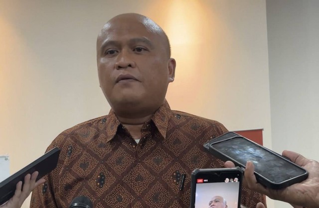 Anggota Komisioner KPPU Hilman Pujana di Kantor KPPU, Jakarta pada Rabu (28/2/2024). Foto: Widya Islamiati/kumparan