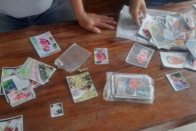 Sejumlah foto yang ditemukan di kediaman tukang santet di Tangsel. Foto: Dok. Istimewa