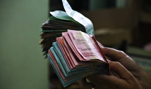 Tempat penukaran uang baru Bandung. Foto hanyalah ilustrasi bukan tempat sebenarnya. Sumber: Unsplash/Mufid Majnun