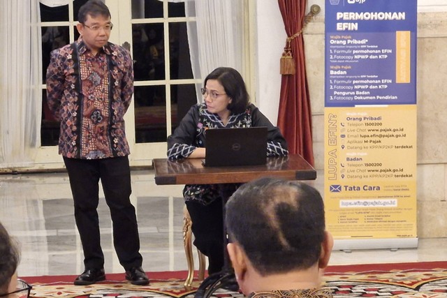 Menteri Keuangan Sri Mulyani melaporkan SPT Tahunan di Istana Negara, Jakarta, Jumat (22/32024). Foto: Nadia Riso/kumparan