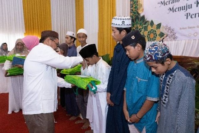 Safari Ramadan PTLNN Group berbagi bersama anak yatim, dhuafa dan marbut masjid. Foto: Dok. PTPN XIII