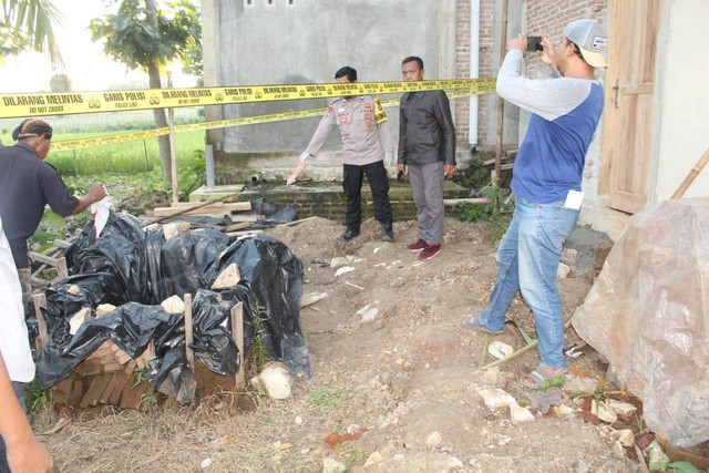 Lokasi penemuan balita tewas tenggelam di lubang septic tank di Dusun Banjarejo, Pekon Mataram, Gadingrejo, Pringsewu. | Foto: Dok Polres Pringsewu