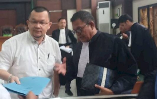 Eks Ketua KONI Sumsel usai menjalani sidang perdana, Foto : Istimewa