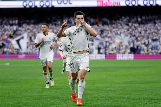 Pemain Real Madrid Brahim Diaz merayakan gol pertama mereka di Santiago Bernabeu, Madrid, Spanyol, Sabtu (4/5/2024). Foto: Juan Medina/REUTERS