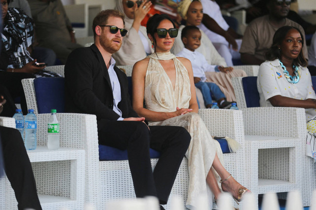 Pangeran Harry dan Meghan menghadiri acara penggalangan dana polo di Lagos, Nigeria, 12 Mei 2024. Foto: REUTERS/Akintunde Akinleye