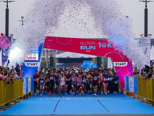 Lomba lari Nu Skin Run 10K di Plaza Parkir Timur Gelora Bung Karno (GBK) Jakarta, Minggu (19/5). Foto: Nu Skin Run.