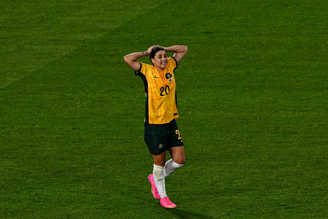 Reaksi pemain Australia Sam Kerr di akhir pertandingan sepak bola semifinal Piala Dunia Wanita Australia dan Selandia Baru 2023 antara Australia dan Inggris di Stadion Australia di Sydney pada 16 Agustus 2023. Foto: Franck Fife/AFP