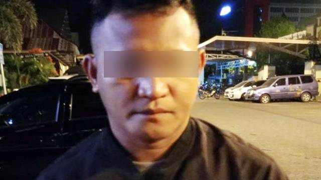 AYP (34) polisi gadungan yang melakukan pemerkosaan terhadap seorang perawat di Manado. AYP juga membawa airsoft gun untuk melakukan pengancaman. (foto: dokumen polresta manado)