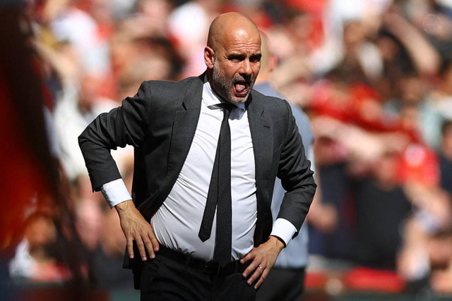 Manajer Manchester City Pep Guardiola pada pertandingan final Piala FA antara Manchester City vs Manchester United di Stadion Wembley, London, Inggris, Sabtu (25/5/2024). Foto: Hannah McKay/Reuters