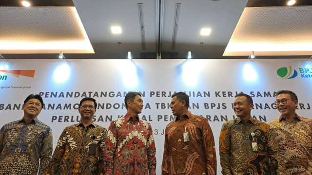 Penandatanganan perjanjian kerjasama BPJS Ketenagakerjaan dengan PT Bank Danamon Indonesia Tbk (Danamon) perluasan kanal pembayaran iuran.  Foto: Ghifari/kumparan 