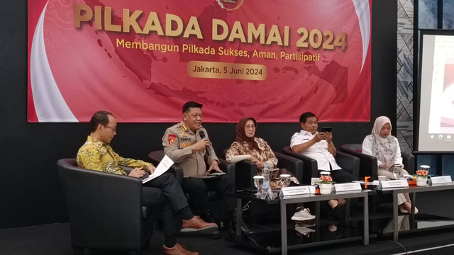 Karoops Polda Metro Jaya Kombes Pol Tory Kristianto dalam seminar Pilkada Damai di Kantor Dewan Pers, Jakpus, Rabu (5/6/2024). Foto: Thomas Bosco/kumparan