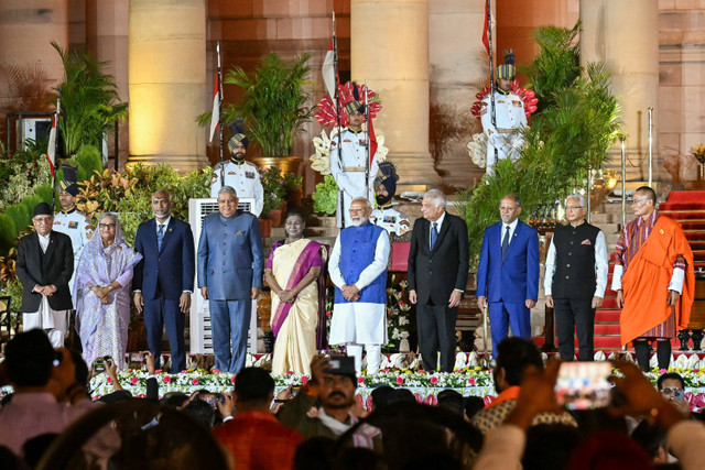 Perdana Menteri India Narendra Modi yang baru dilantik selama upacara pengambilan sumpah di istana presiden Rashtrapati Bhavan, New Delhi, India, Minggu (9/6/2024). Foto: Money SHARMA / AFP
