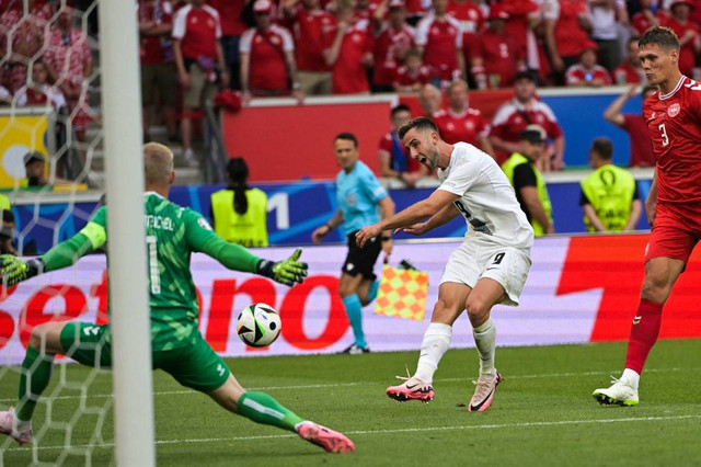 Slovenia vs Denmark di Piala Eropa 2024. Dok: DAMIEN MEYER / AFP