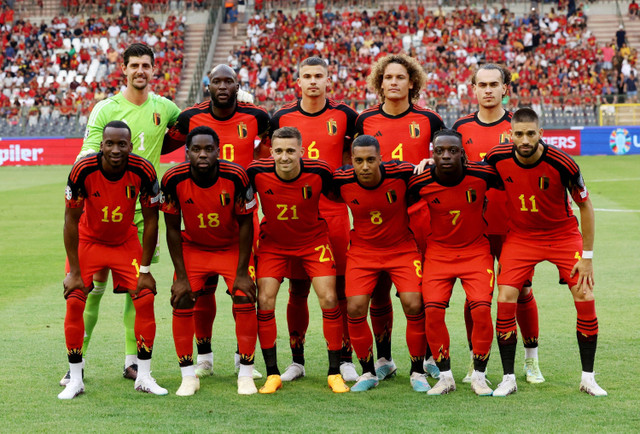 Pemain Timnas Belgia foto bersama sebelum pertandingan melawan Austria. Foto: Yves Herman/ REUTERS