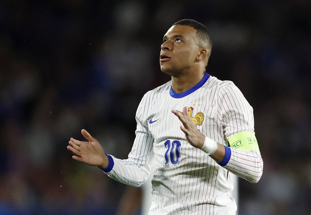 Pemain Timnas Prancis Kylian Mbappe saat melawan Kanada pada pertandingan persahabatan di tade Matmut-Atlantique, Bordeaux, Prancis, 9 Juni 2024. Foto: Stephane Mahe/ REUTERS