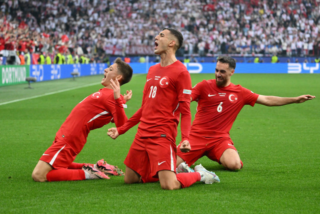 Selebrasi pemain Timnas Turki usai mencetak gol ke gawang Timnas Georgia pada pertandingan Grup F Piala Eropa 2024 di Signal Iduna Park, Dortmund, Jerman, Selasa (18/6/2024). Foto: ALBERTO PIZZOLI / AFP