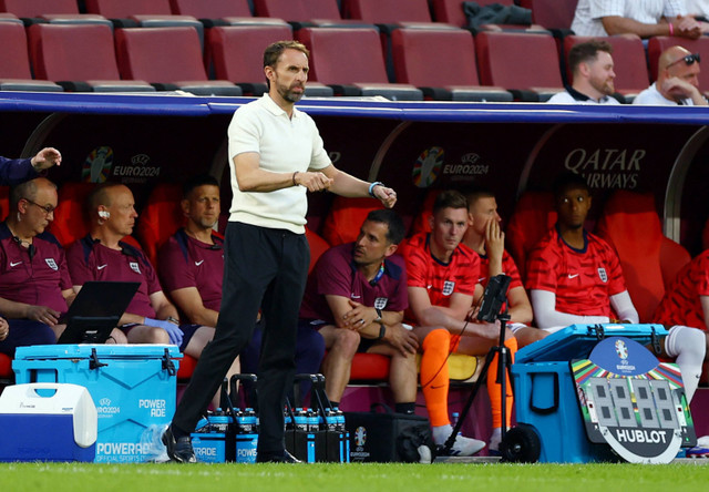 Manajer Inggris Gareth Southgate bereaksi saat pertandingan Inggris melawan Slovenia di Stadion Cologne, Cologne, Jerman, Selasa (25/6/2024). Foto: Lee Smith/REUTERS 