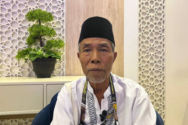 Salamun tukang parkir asal Jombang naik haji.  Foto: Salmah Muslimah/kumparan